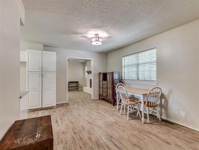 Dining room with light hardwood / wood-style floor
