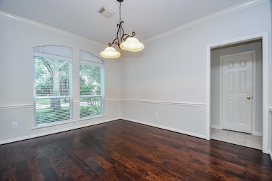 Formal Dining Room with wood floors and freshly pa