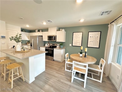 Kitchen with appliances with stainless steel finis
