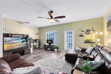First floor great room with a balcony & LVP floors