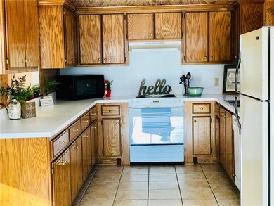 Cabinets galore and slick as a whistle clean.