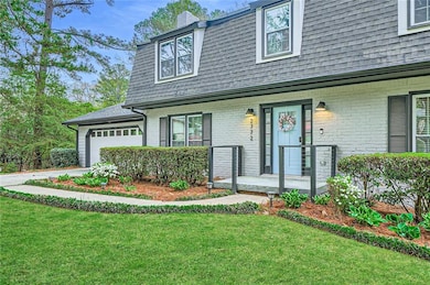 Painted Brick Exterior and inviting front entry