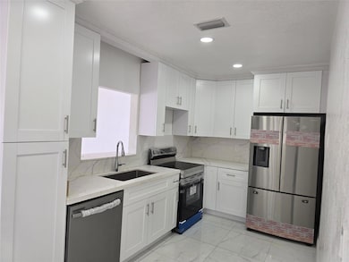 1220 NE 206th St, Miami, FL 33179 - photo 2