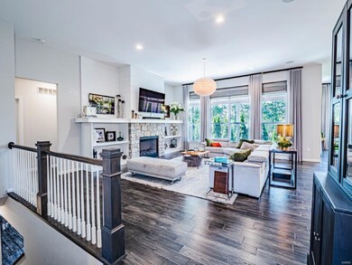 11 foot ceilings and dramatic windows throughout t