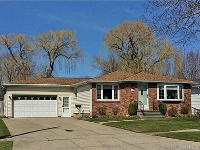 Exterior Front. 2 Car garage has doors front and b
