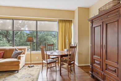 The space can accommodate living room furniture plus a game table!