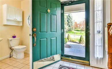 Full view storm door looks out onto the peaceful s