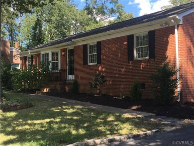 Welcome Home ! Front entry with Brick stoop, paved driveway with stone edging and concrete walkway!