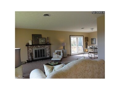 Open living room into dining room
