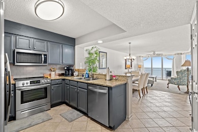 Kitchen featuring appliances with stainless steel 