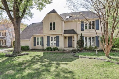 View of front facade featuring a front lawn and a 