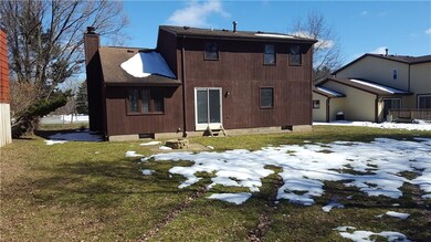 Rear of house - sliding glass door enters into the