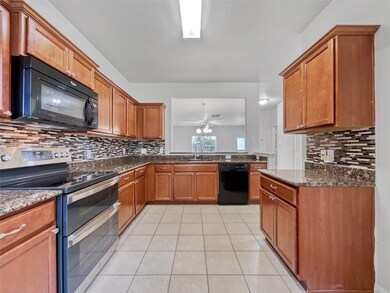 12231 Estelle Ln, Pinehurst, TX 77362 - photo 6