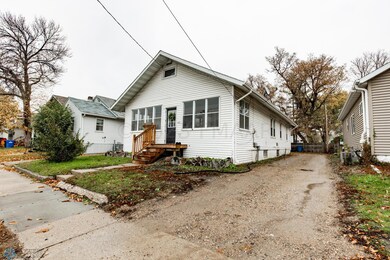 Front/Side Exterior + Driveway