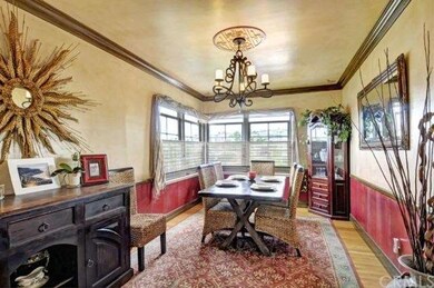 large formal dining room with mountain and downtow
