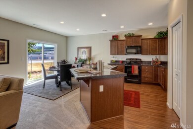 907 Colorossi Cir NW unit 60, Orting, WA 98360 - photo 2