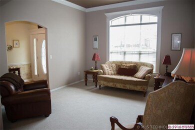 Formal living room features beautiful picture wind