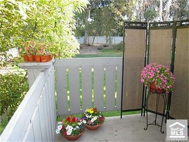 Private deck with greenbelt view .