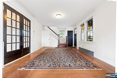 Living Room + French Doors leading to Formal Dining Room