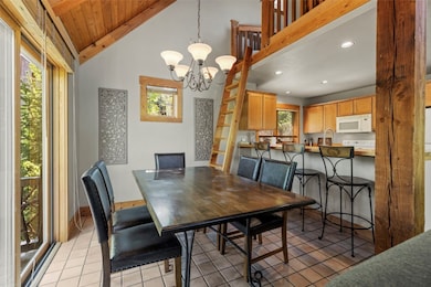 Dining room featuring a chandelier, recessed light