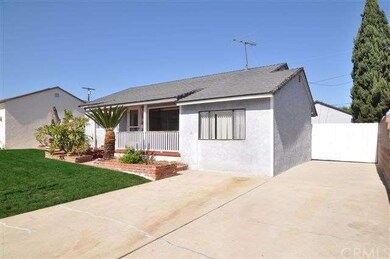 Home has an extra wide and long driveway to the detached garage
