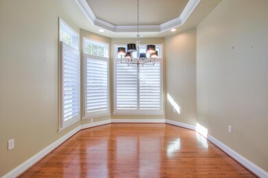 Dining Room/nook with tray ceiling.