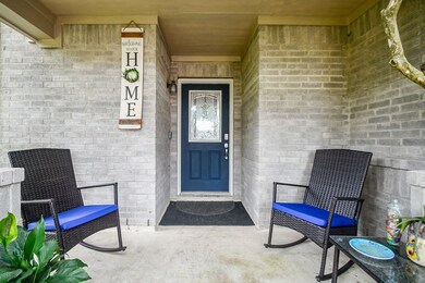 Charming front porch with a welcoming atmosphere,