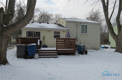Rear view showing deck off the breakfast room.  Ni