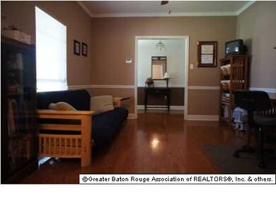 FORMAL LIVING WITH WOOD FLOORS