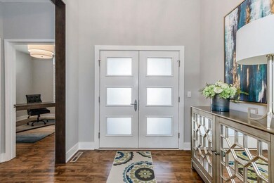 The main floor has beautiful hardwood floors throu