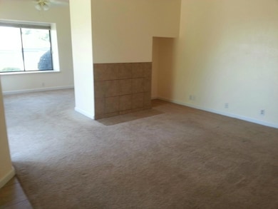 Fireplace covered by tile wall