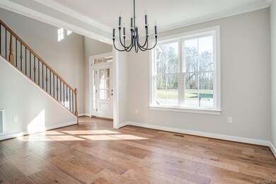 Dining Room and Foyer photo of similar home; home 