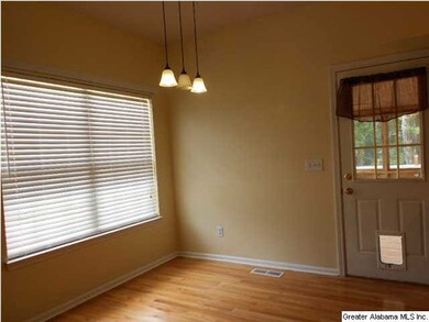 Eating area in kitchen w/updated lighting