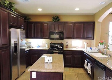 Upgraded kitchen with granite countertops and open