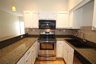 Kitchen has lots of counter & storage space.