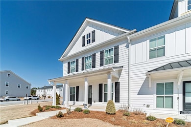 View of front of home with board and batten siding