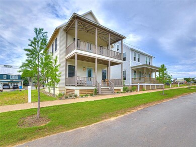 Multi unit property with a balcony, a porch, and a front yard