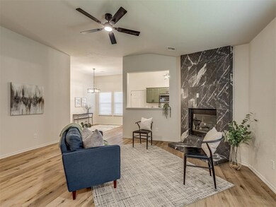 Sitting room featuring light hardwood / wood-style