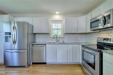 Large Open Kitchen w/ Gleaming Hardwood, NEW Stain
