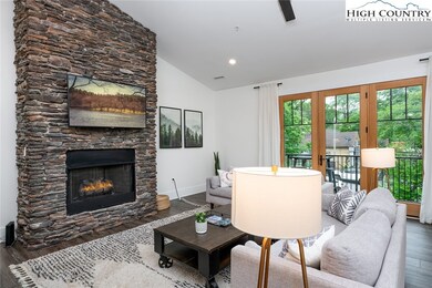floor-to-ceiling stone fireplace
