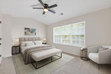 Upstairs, the Primary Suite features a Vaulted Ceiling, a Spa-Like Bathroom with a Stone Dual Vanity, Tub/Shower Combo, and a Large Walk-In Closet.