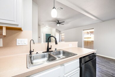 This home is light and bright and features a breakfast bar for those quick bites before heading out the door!