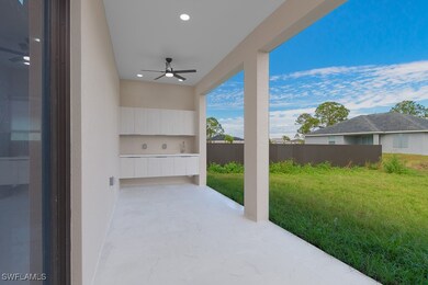 View of patio with a ceiling fan