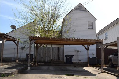 Two-car carport accesses private back patio