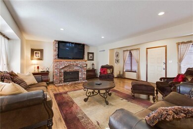 Fabulous brick fireplace with convenient electric 
