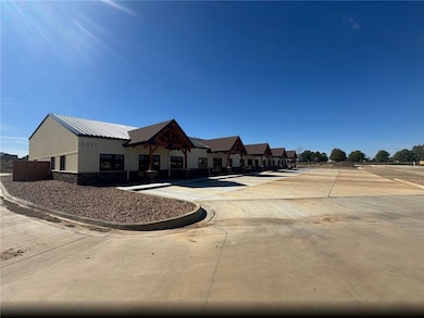 Grand Slam Business Park is a premier mixed-use development in Fort Smith. 17.72 acres, the property offers three 1.1-acre lots, 12 flexible buildings, fiber-optic connectivity, LED signage, and new road access with 20,000+ daily vehicle exposure. Projected returns include $1.836M annual rental income, $1M+ lot sales, and a 15.3% ROI. With proximity to Fort Smith Regional Airport and regional growth fueled by military expansion, this is a rare investment opportunity.