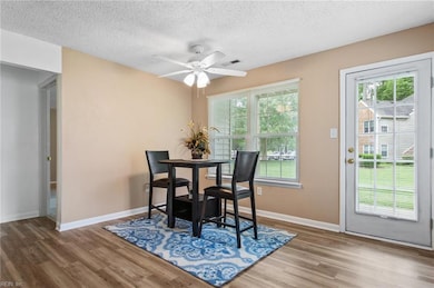 Dining room with door leading to patio
