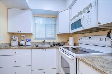 6767 Sunset Way unit 203, Saint Pete Beach, FL 33706 - photo 6