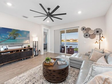 Living area with recessed lighting, visible vents,