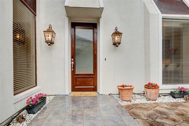 Welcome through the gated entrance to a spacious f